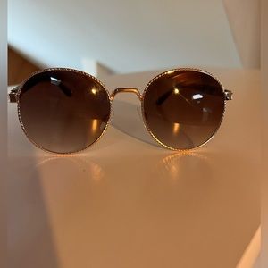 Circle sunglasses, gold and tortoise shell sunglasses.